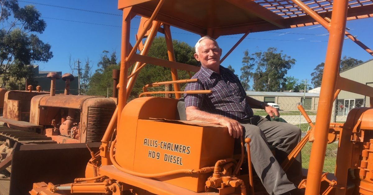 photo of george oscar ronalds on a tractor