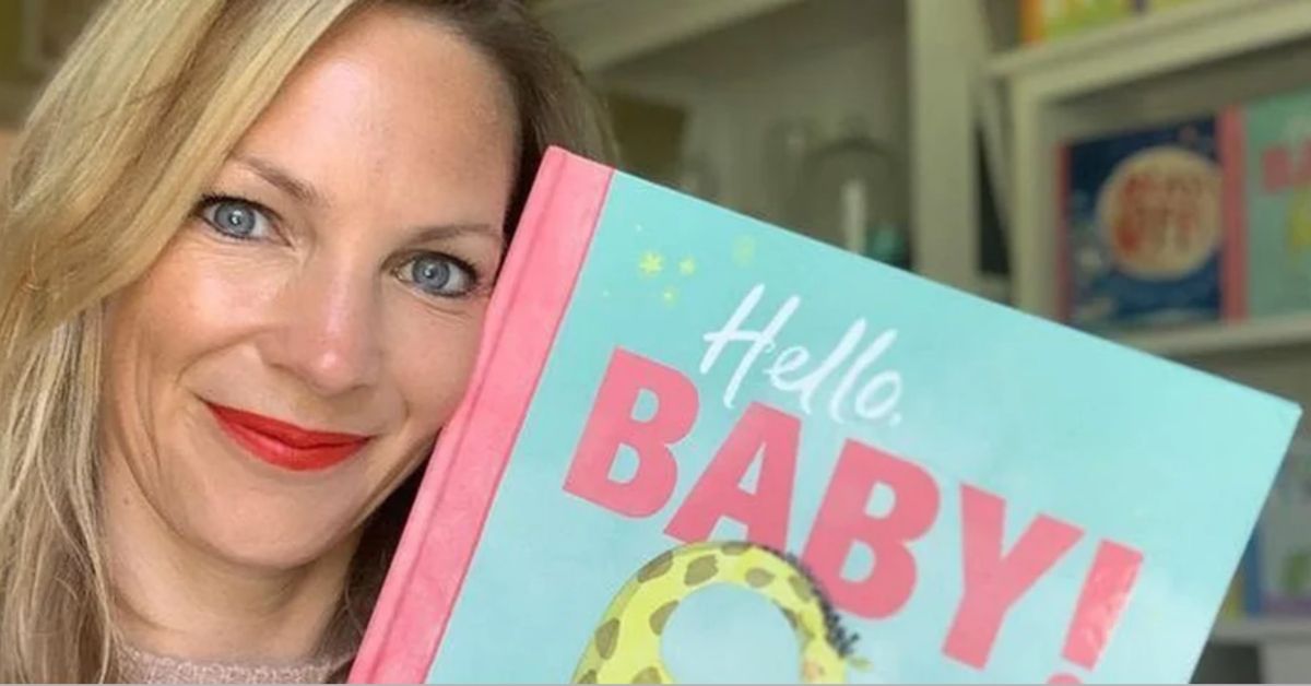 shelley unwin holding her book called hello baby!